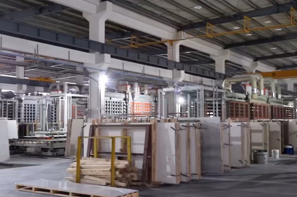 Manufacturing plant for quartz slabs