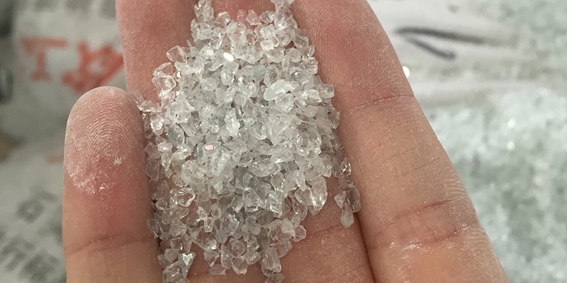 Close-up of high-purity raw quartz crystals before being ground for production
